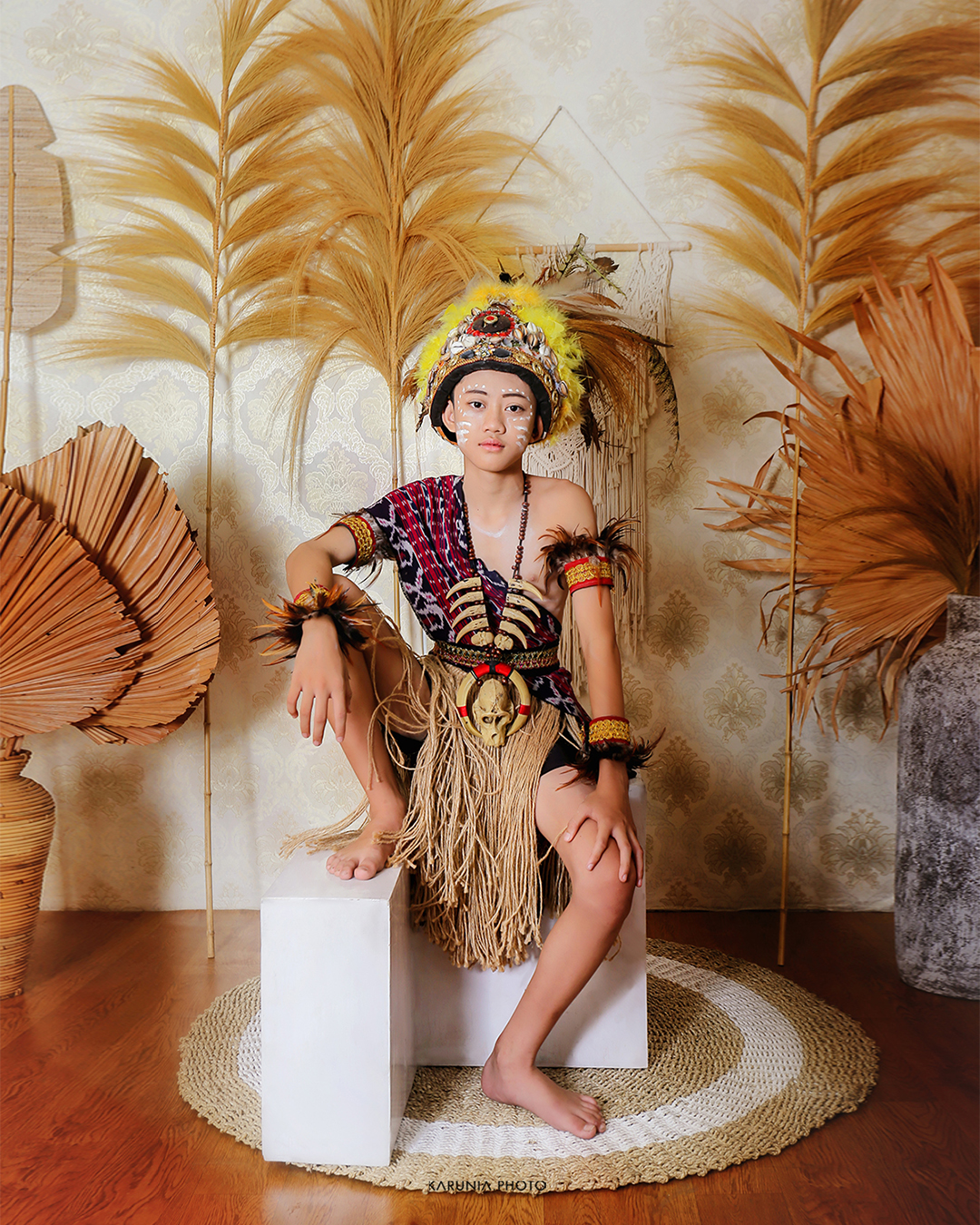 Artistic portrait with creative lighting effects casting geometric shadows across the subject's face